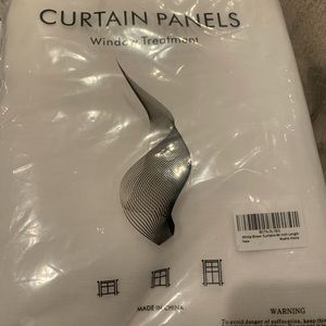 Brand new, sheer window drapes, white; 52x84. Can be sold individually.